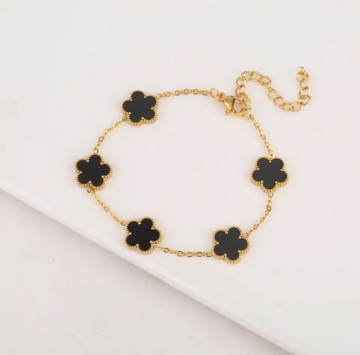 FLOR NEGRA-PULSERA ORO CON FLOR NEGRA