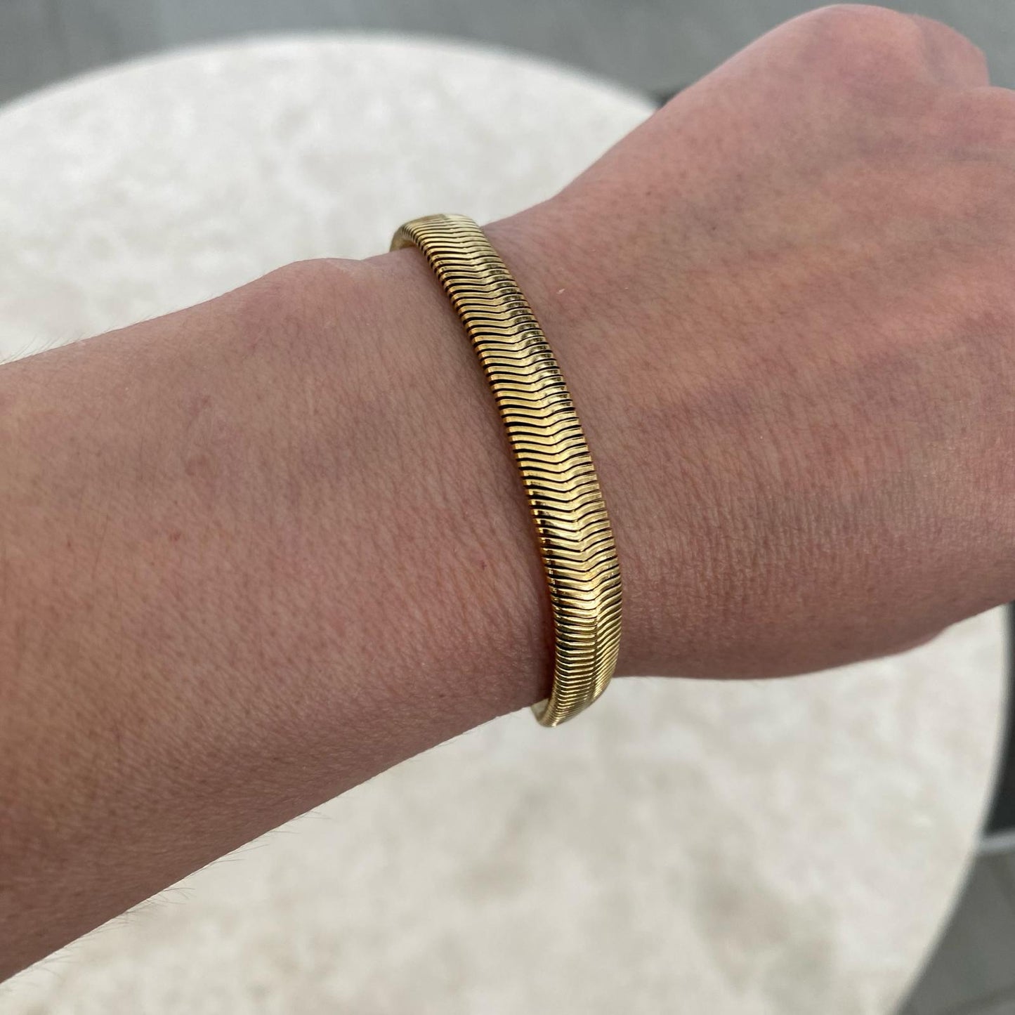 PULSERA CELESTE-SERPIENTE DORADA